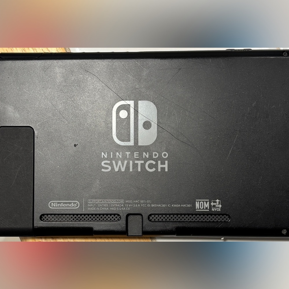 Nintendo Switch console with red and blue joy cons